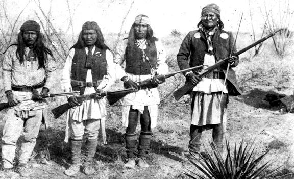 Apache chieff Geronimo (right) and his warriors in 1886