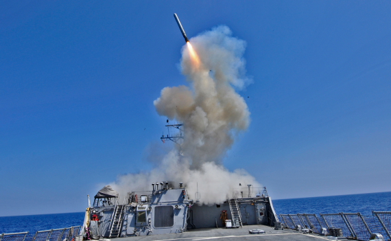 The guided missile destroyer USS Barry (DDG 52) launches a Tomahawk cruise missile March 29, 2011, in the Mediterranean Sea while operating in support of Operation Odyssey Dawn. [Photo: AN HONORABLE GERMAN's photostream; Flickr Account] 