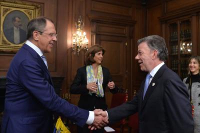 epa04677714 A handout picture made available by the Presidency of Colombia shows Colombian President Juan Manuel Santos (R) shaking hands with Russian Minister of Foreign Affairs Sergey Lavrov (L) during their meeting in Bogota, Colombia, 24 March 2015. Lavrov started a Latin American tour which will see him visiting Cuba, Colombia, Nicaragua, and Guatemala.  EPA/CESAR CARRION/PRESIDENCY OF COLO  HANDOUT EDITORIAL USE ONLY/NO SALES