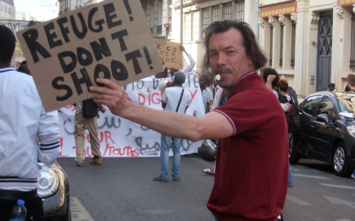 Protesta de apoyo a los refugiados [Foto: Jeanne Menj via Flickr]