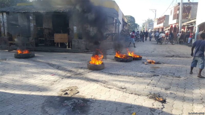 2019_Haitian_protests_tire_fire-scaled.png