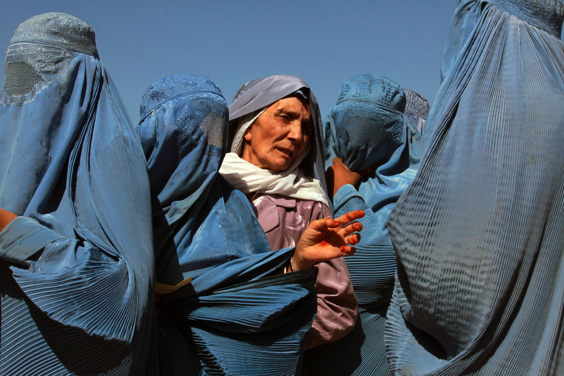 Afghan Women Queue at World Food Programme Distribution Point